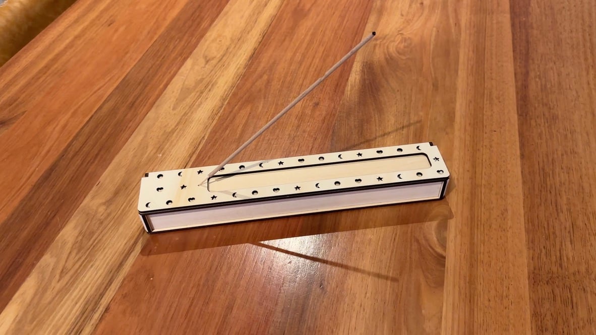 Wooden incense holder decorated with moons, stars and hearts