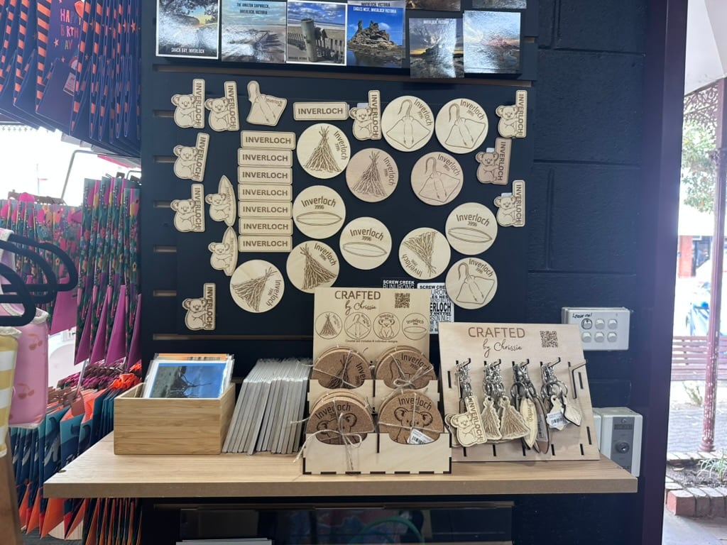 Chrissie's locally themed wooden souvenirs displayed at Paperplay Inverloch