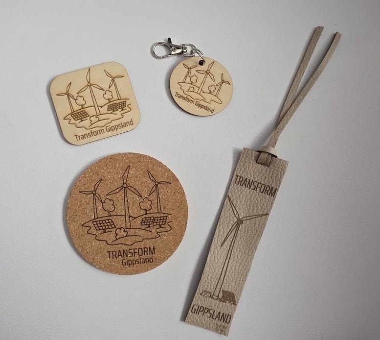 A branded coaster, keyring, bookmark and magnet for TRANSFORM Gippsland